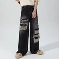 Wide-leg distressed denim jeans
