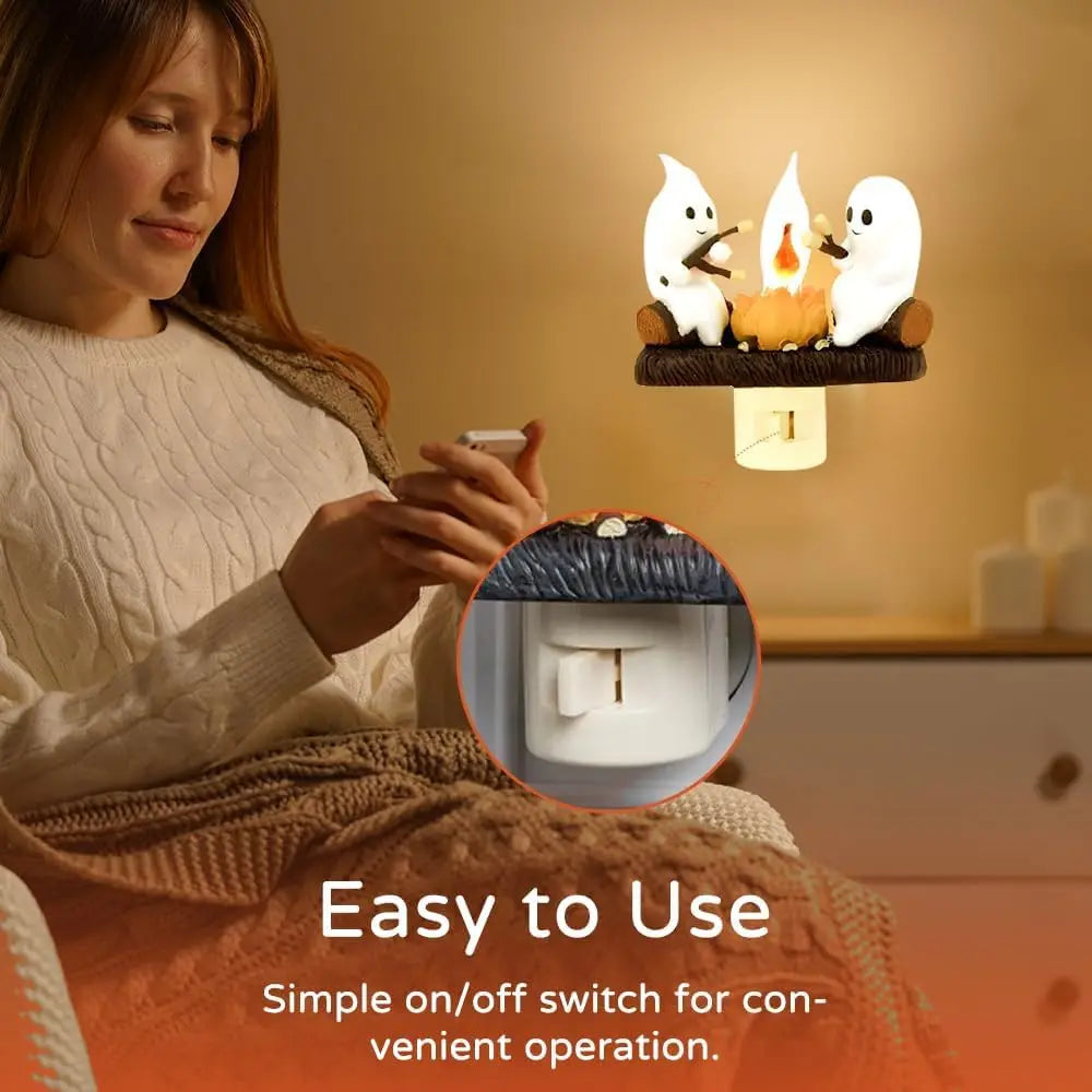 Ghost campfire LED decor lighting up an indoor table setting at night